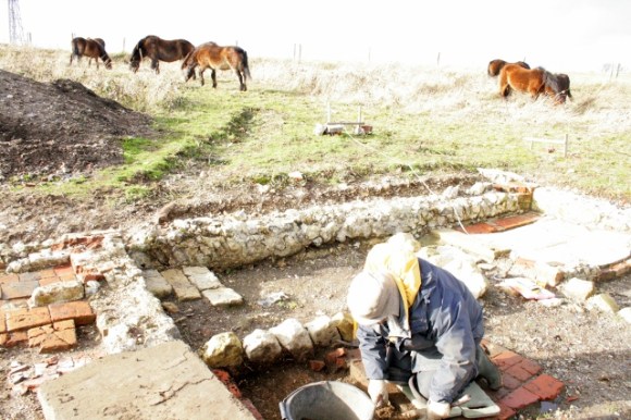 Looking NE at excavation under front doorstep
