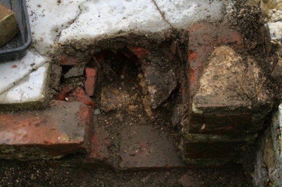 Looking W at excavation of NE corner of outside toilet