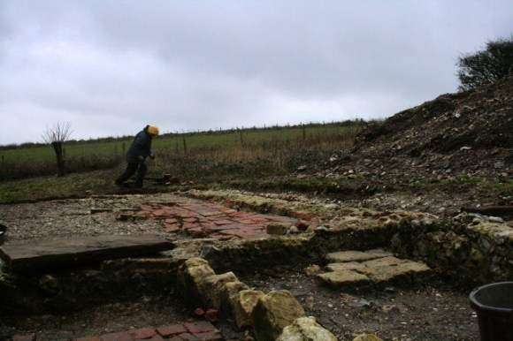 View S from beside outside toilet across dig site, battling against the cold wind!