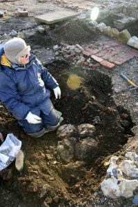 Looking SW at excavation of cobbled flint surface between front garden gate & front door of cottage; 9th February 2014