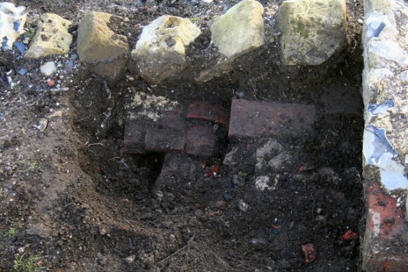 Looking S from E of outside toilet at sondage below 1940's ground surface