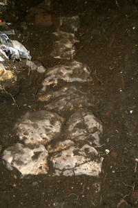 Looking NE at excavation of cobbled flint surface between front garden gate & front door of cottage; 9th February 2014