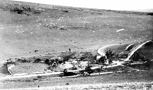 Shattered remains of Balsdean Farm at the end of the war, showing mortar and shell craters on hillside.