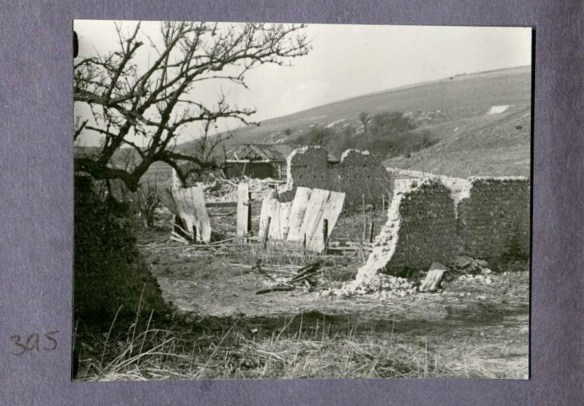 Photo 395. Badly destroyed Norton Farm. In Captain Bertie Hubbard Maclaren's scrapbook. Brighton & Hove Royal Pavilion and Museums, ref. HA930078.