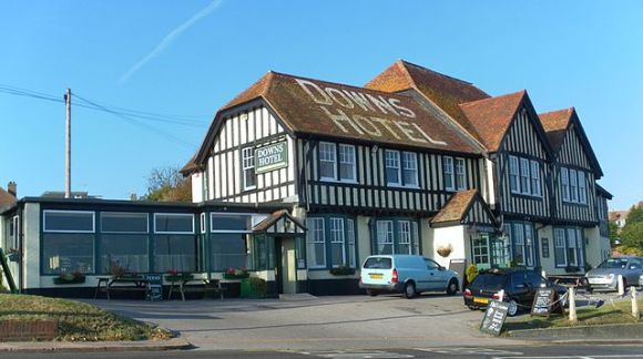 The Downs Hotel, Warren Road, Woodingdean, City of Brighton and Hove, England. 22 October 2011. By Hassocks5489 (Own work) [CC0], via Wikimedia Commons.